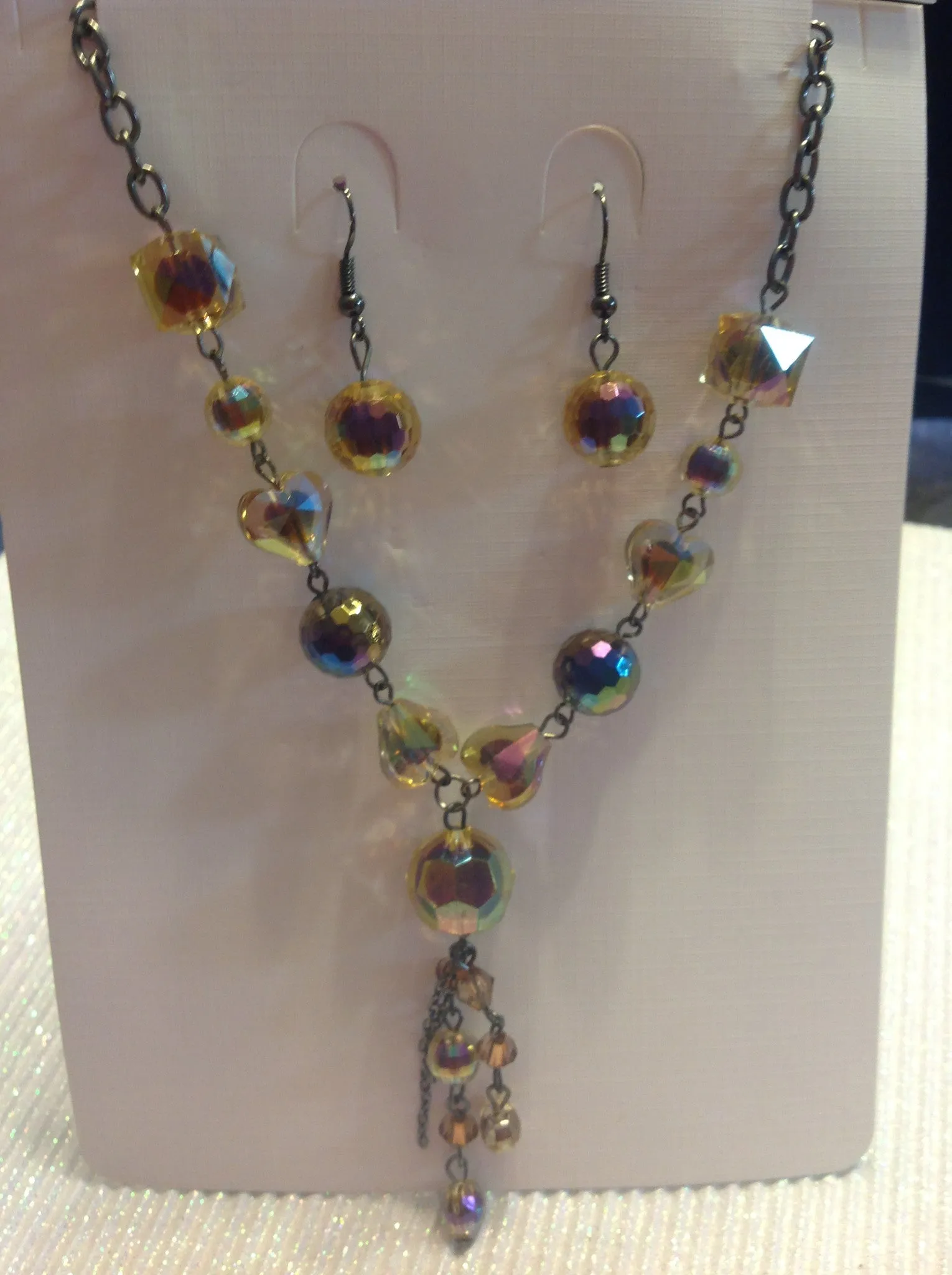 Faceted crystal beaded necklace with earrings.