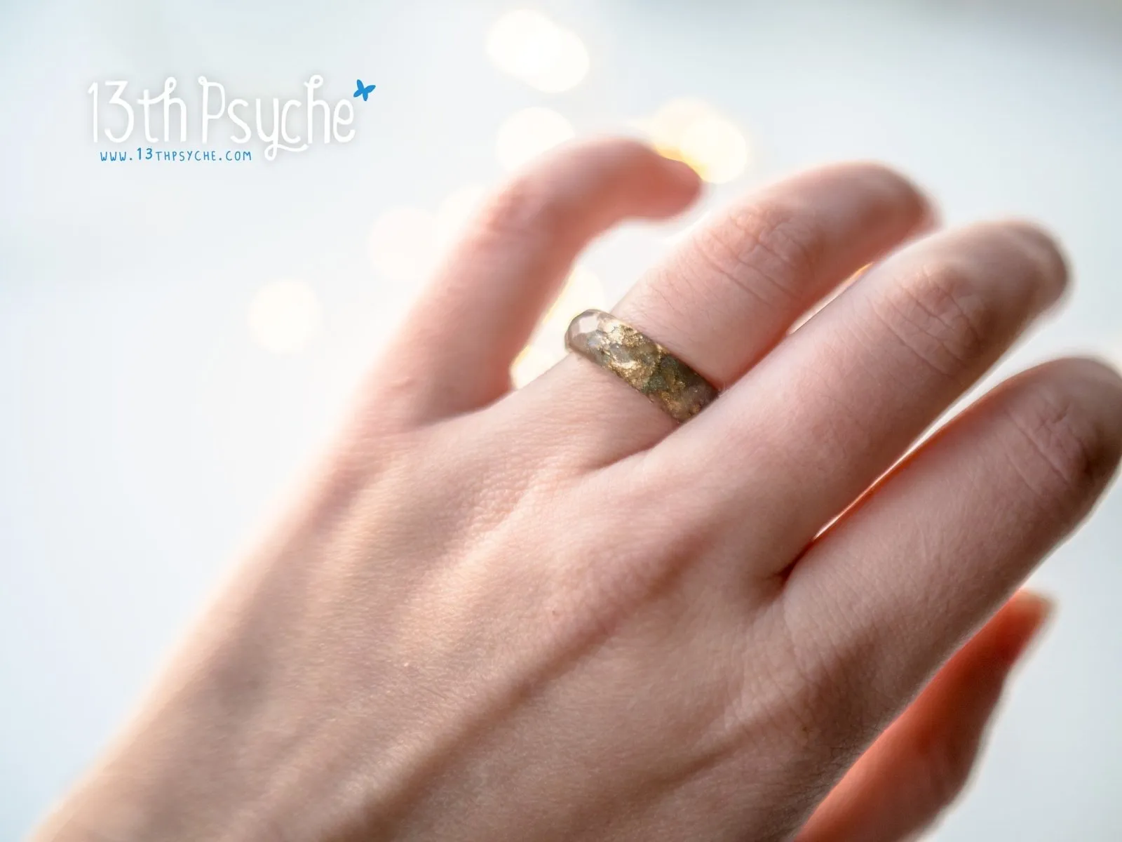 Iridescent green faceted resin ring with gold flakes