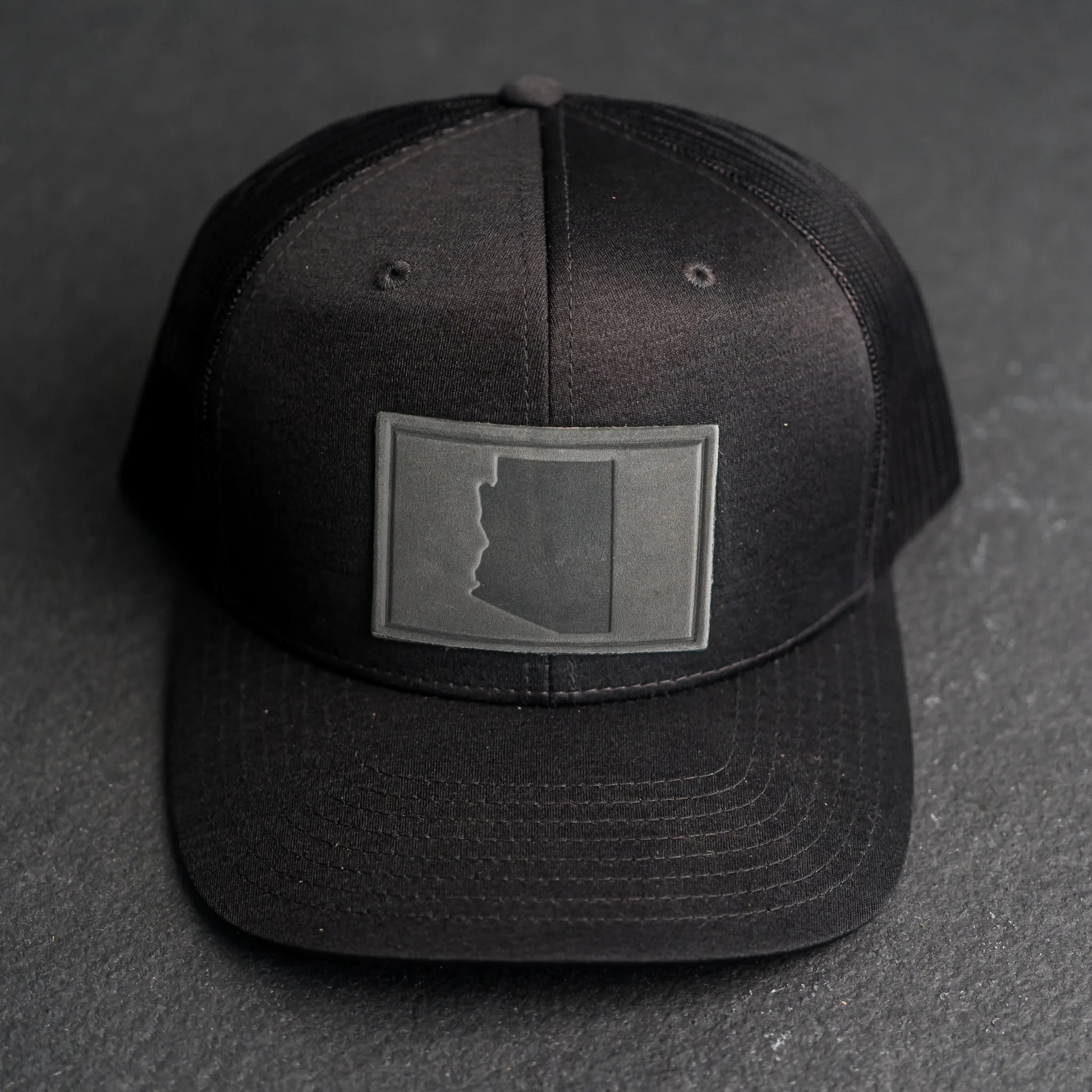 Leather Patch Performance Style Trucker Hat - Arizona Stamp