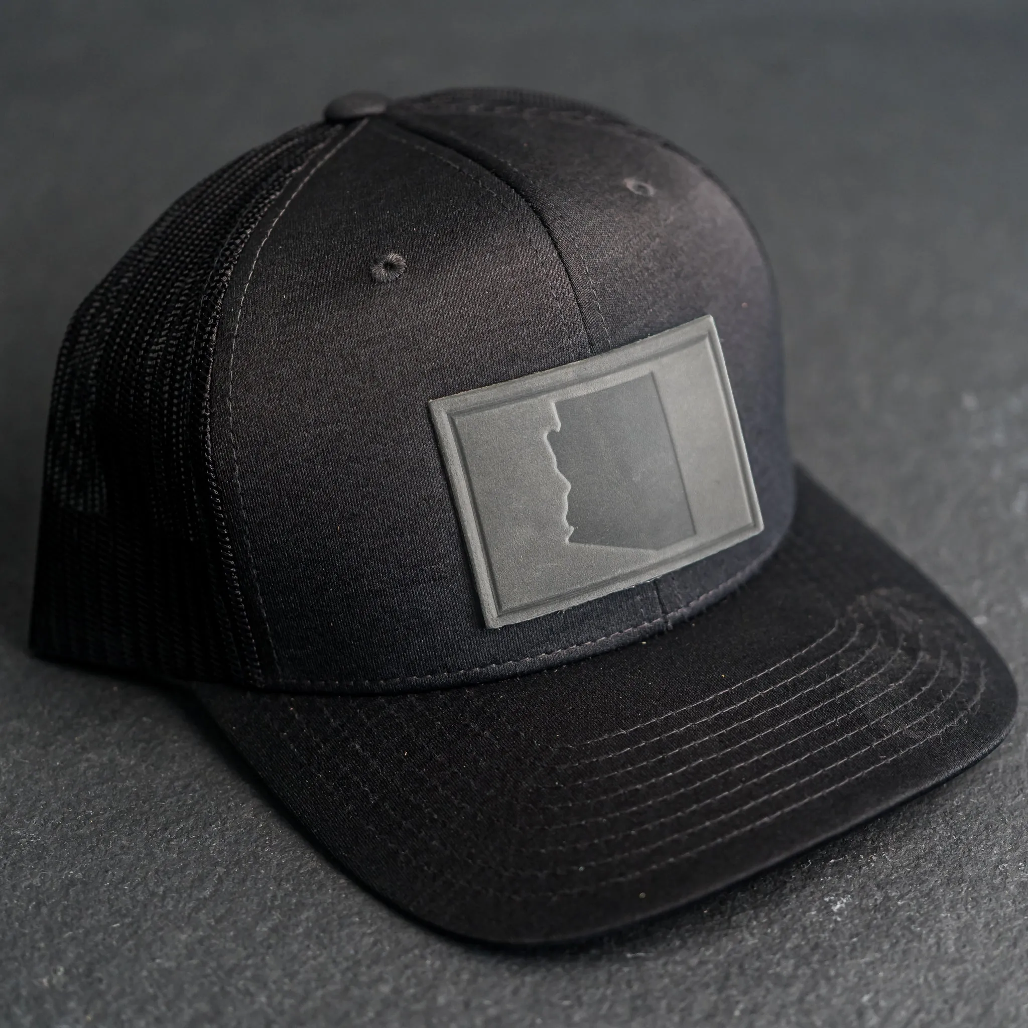 Leather Patch Performance Style Trucker Hat - Arizona Stamp