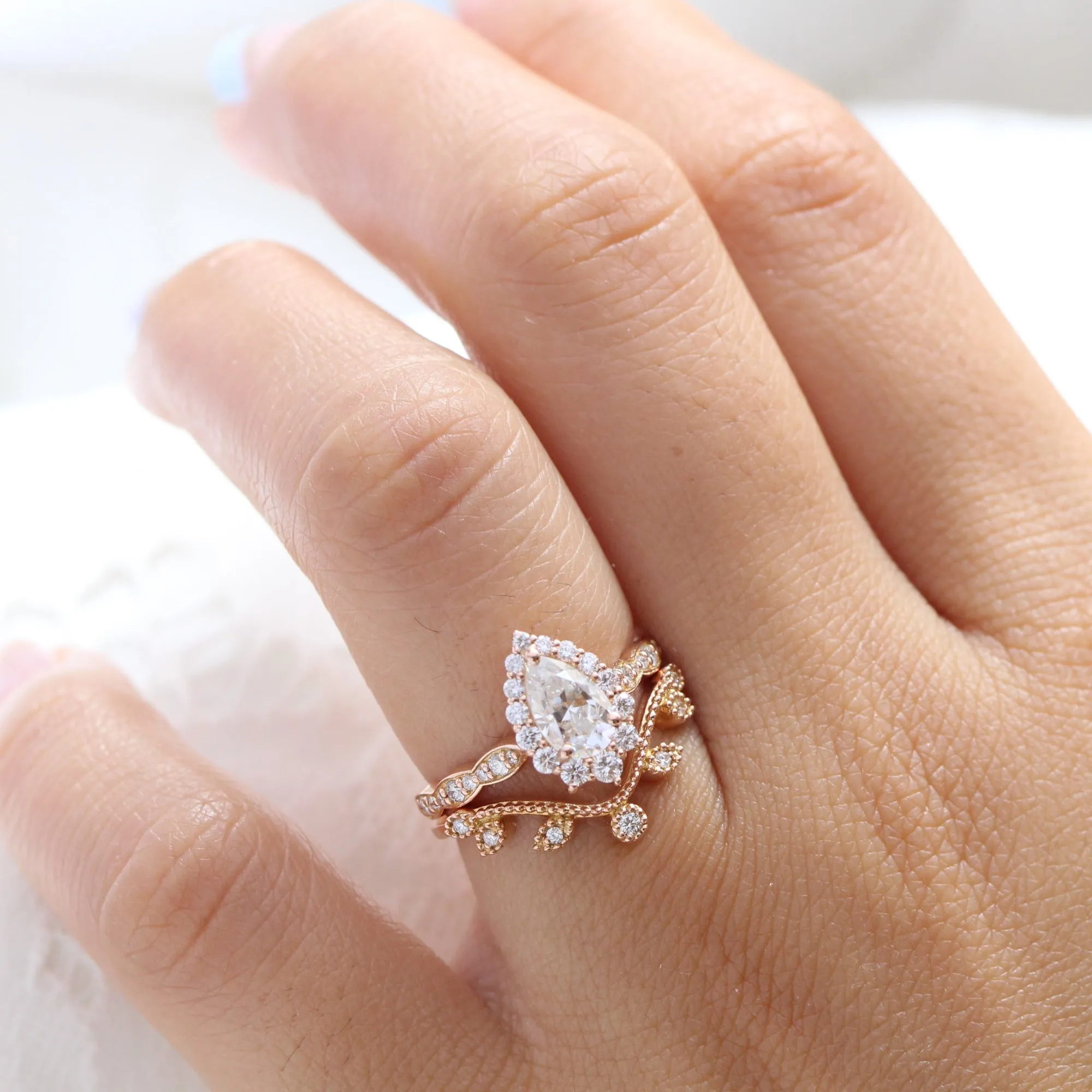 Pear Moissanite Engagement Ring in Tiara Halo Diamond Scalloped Band