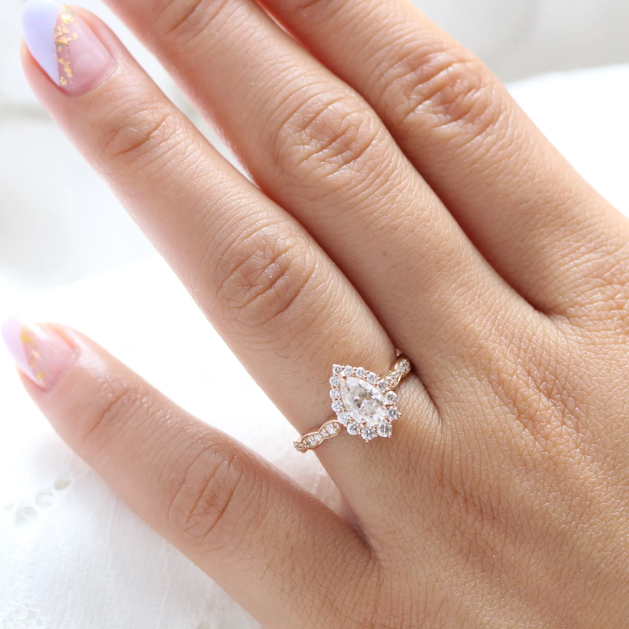 Pear Moissanite Engagement Ring in Tiara Halo Diamond Scalloped Band