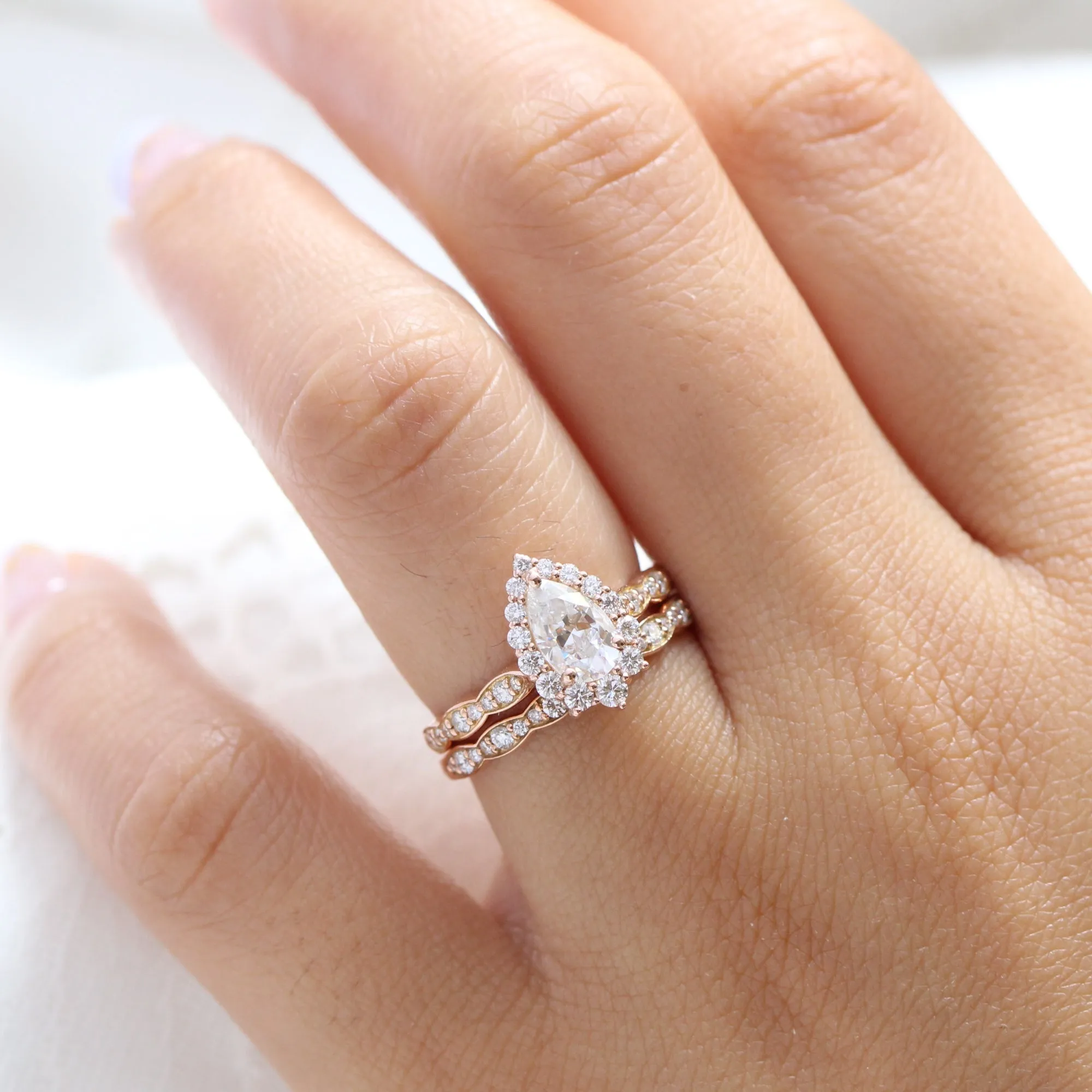 Pear Moissanite Engagement Ring in Tiara Halo Diamond Scalloped Band