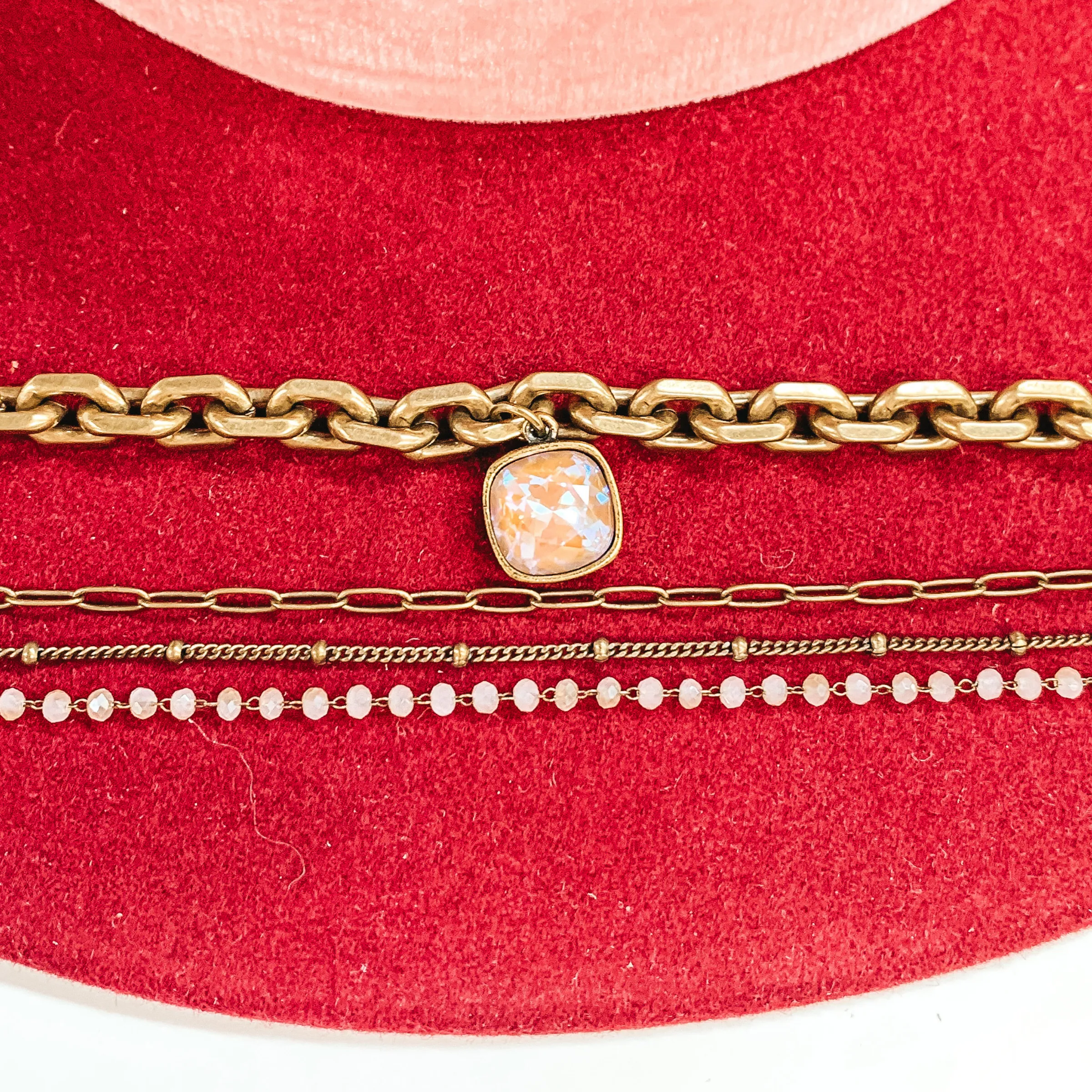 Pink Panache | Four Strand Crystal and Bronze Chain Necklace with Cappuccino Delight Cushion Cut Crystal Drop